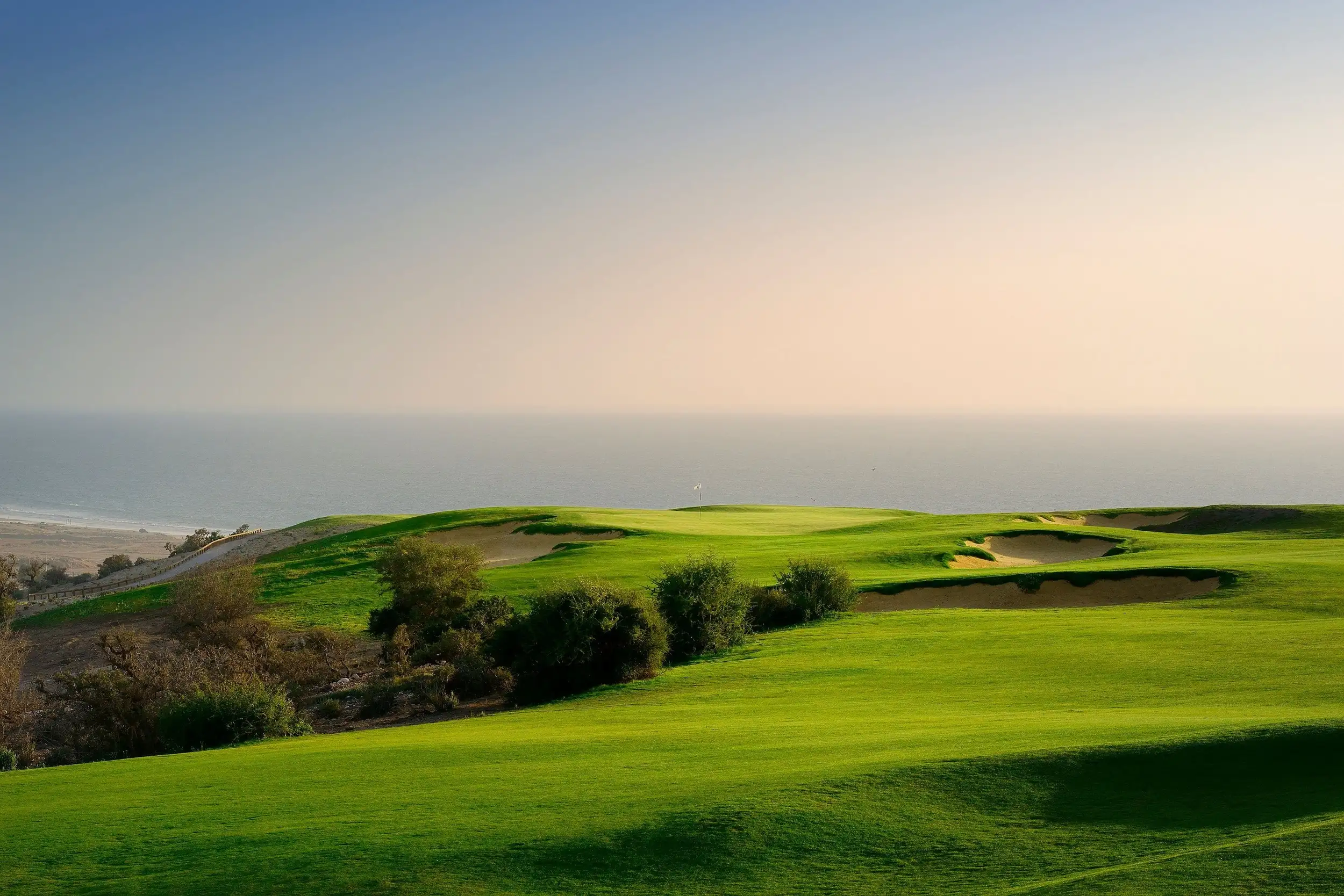 Clifftop fairway at Tazegzout Golf Club above the Atlantic at Taghazout Bay near Agadir